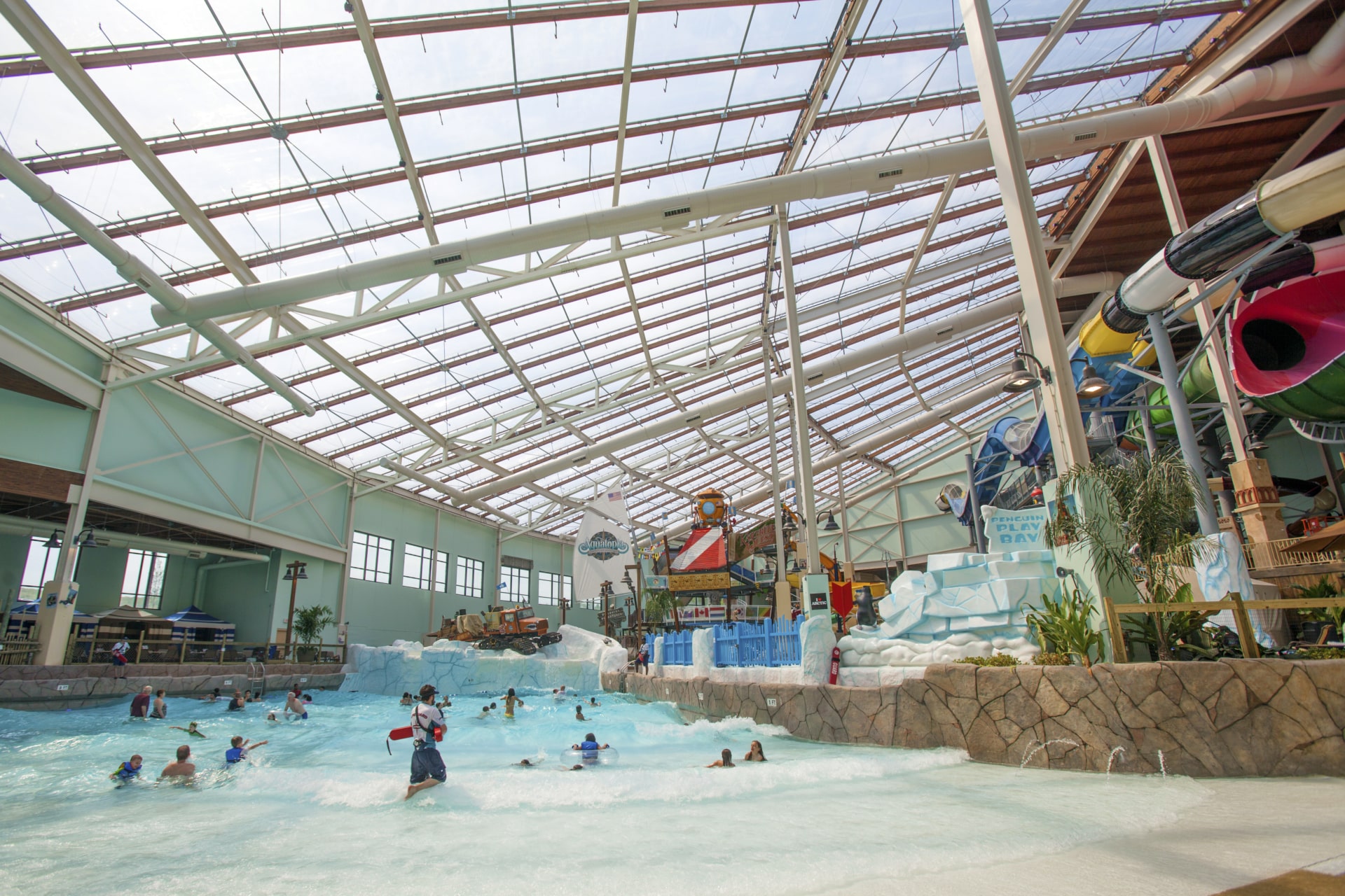 Visitors enjoying the controlled climate in the wave pool.
