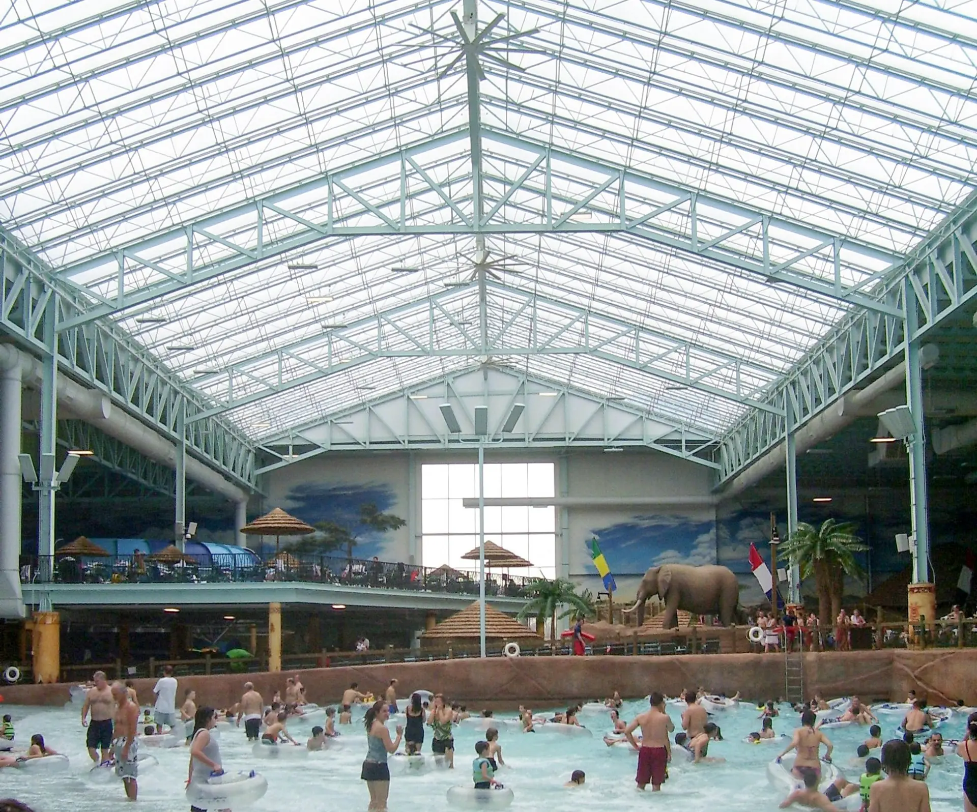 Visitors enjoying the light flooded indoor wavepool
