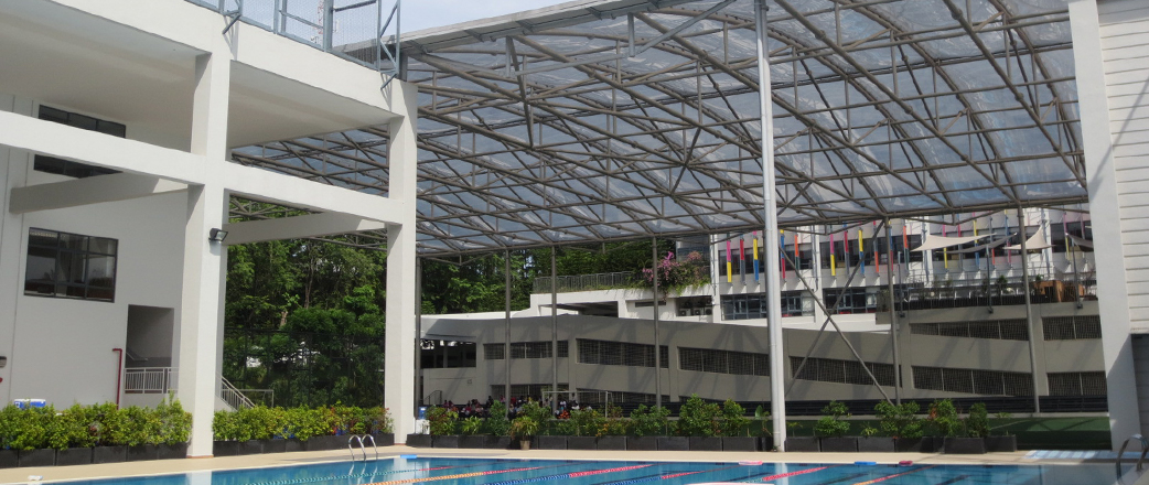 As the weather is typically very hot and particularly humid during rainy season, it was natural to cover the outdoor multi-purpose playgrounds and activity fields with a canopy.