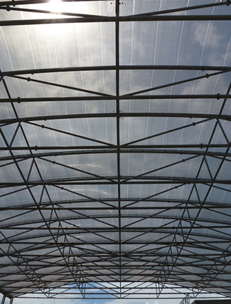 The canopy on plan measures 59 m x 46 m, the clear span between the columns measures over 46 m.