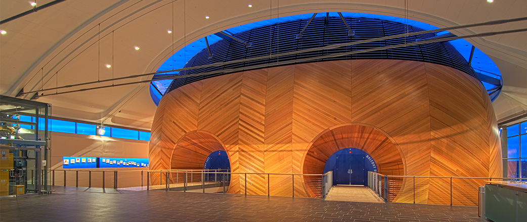 Evening inside EMPAC with the Texlon® ETFE skylights glowing blue from the night sky.