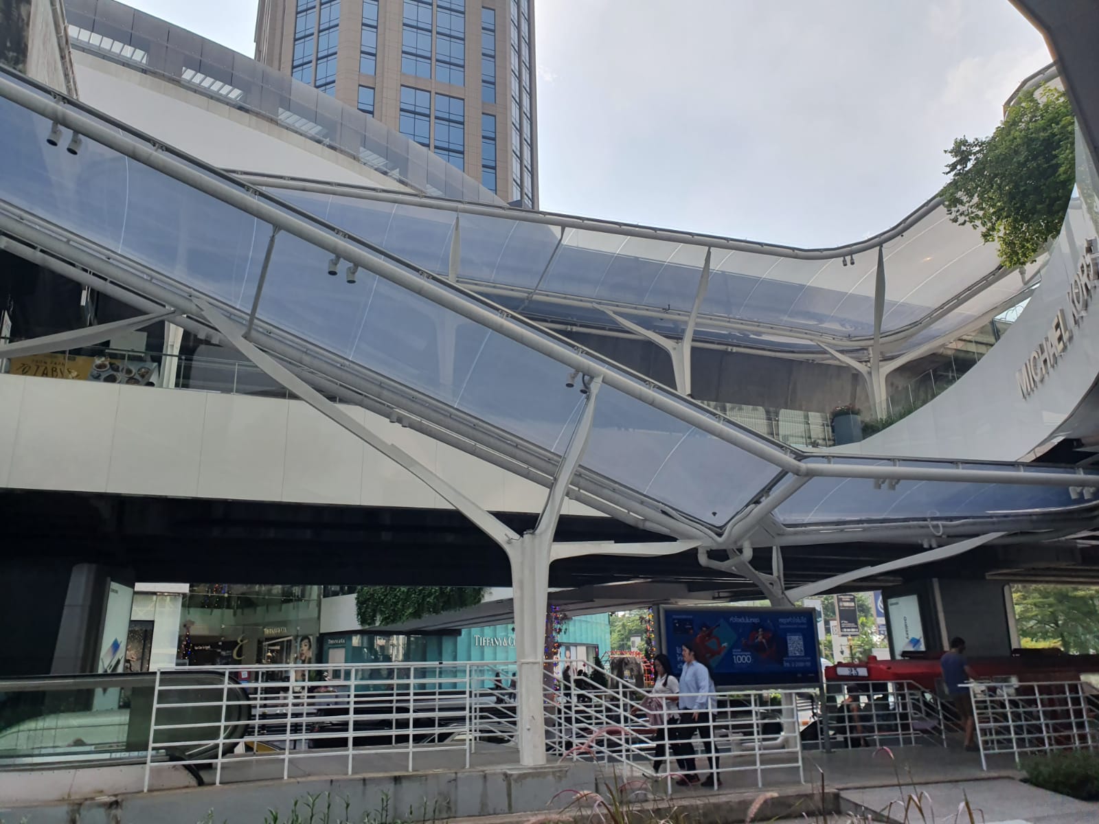 The Texlon® ETFE canopies at the ever-busy Phrom Phong BTS Skytrain station leads a myriad of people in-and-out.