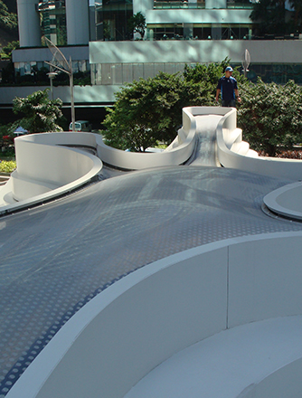 A fine dining restaurant, L4, featuring a swirling ceiling of folded steel and Texlon® ETFE skylight shaped like an ink-splatter.