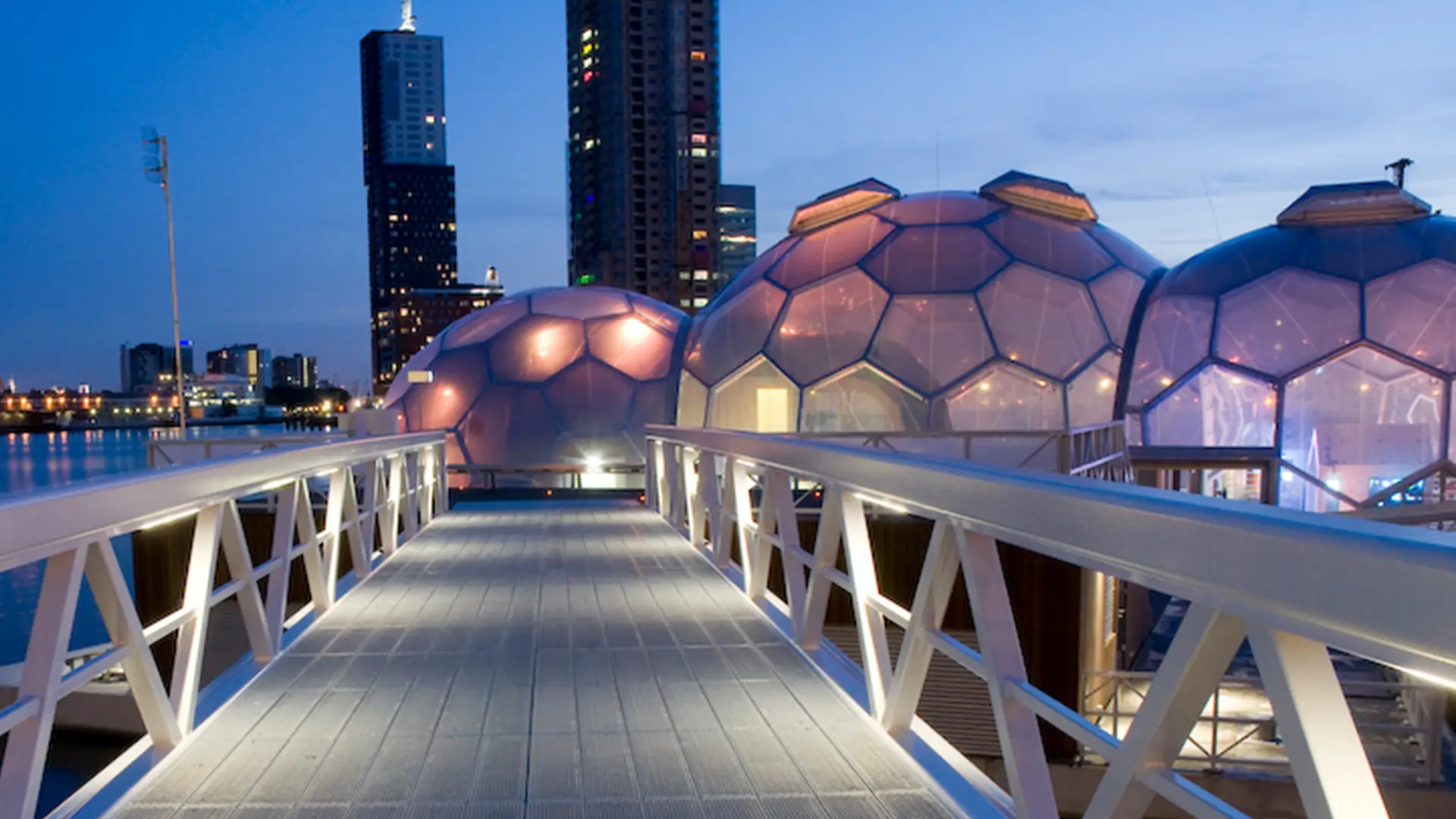 Designed by Deltasync and Public Domain Architects, the domes of the floating pavilion in Rotterdam are clad in Texlon® ETFE by Vector Foiltec