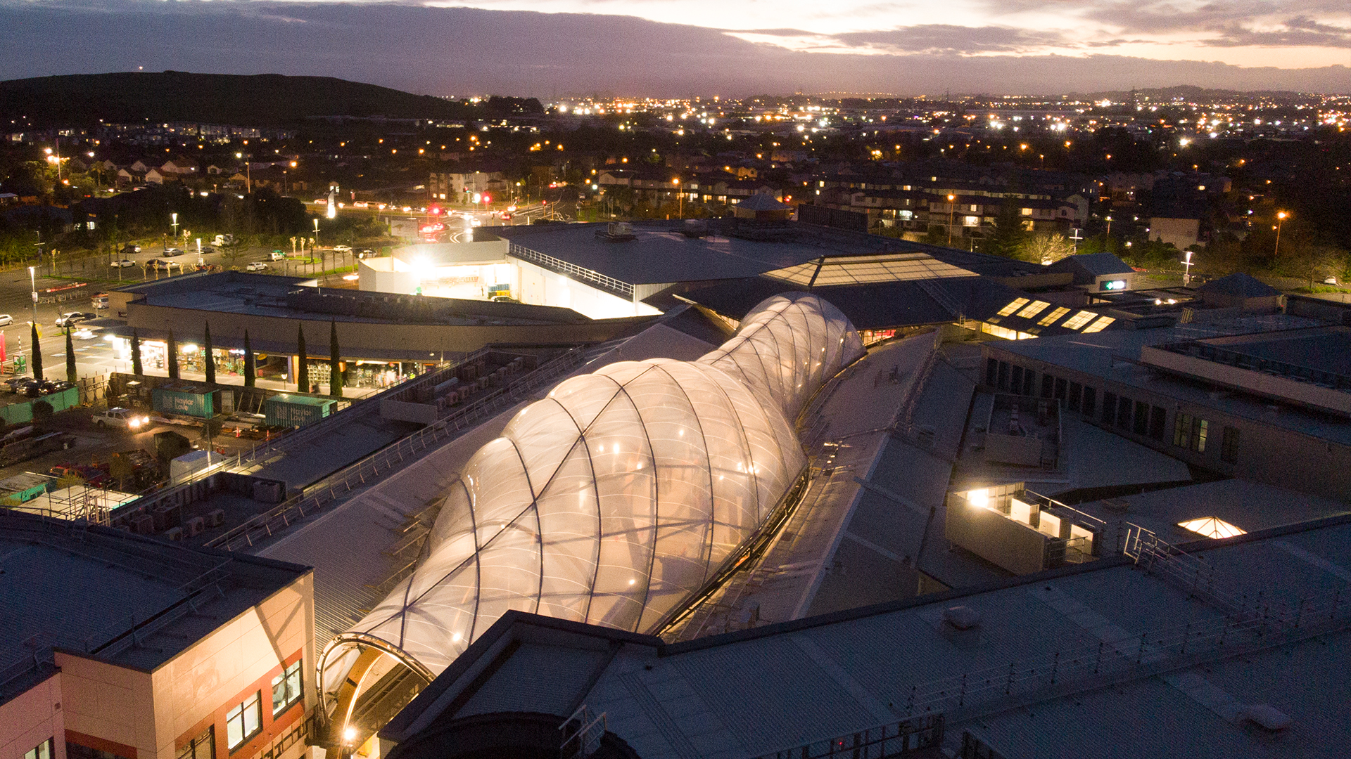 Botany Town Shopping Center: The ETFE cushions warp across the base steelworks frame to give a visually stunning effect.