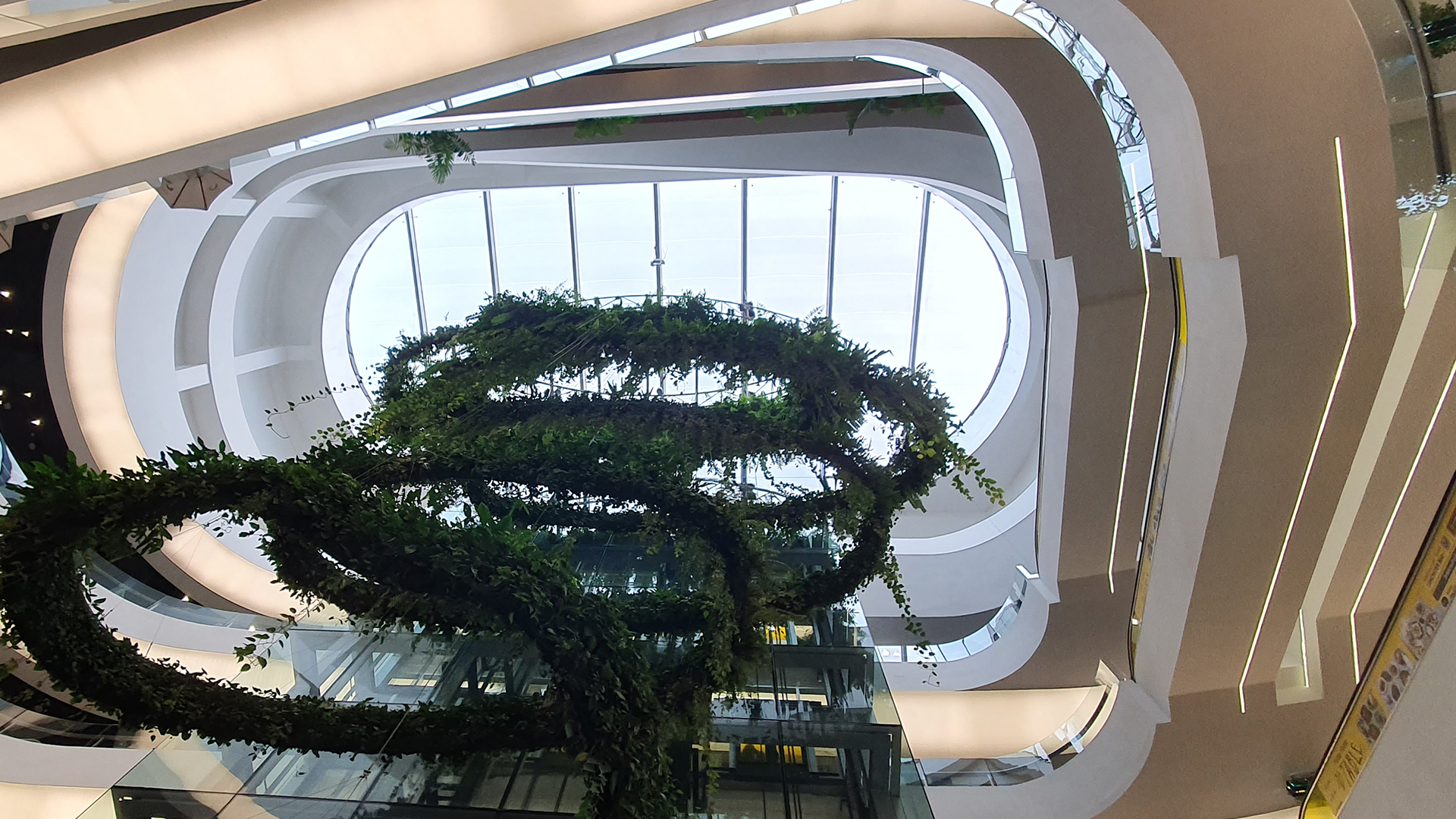 Green vertical interior design of Emquartier shopping mall dining