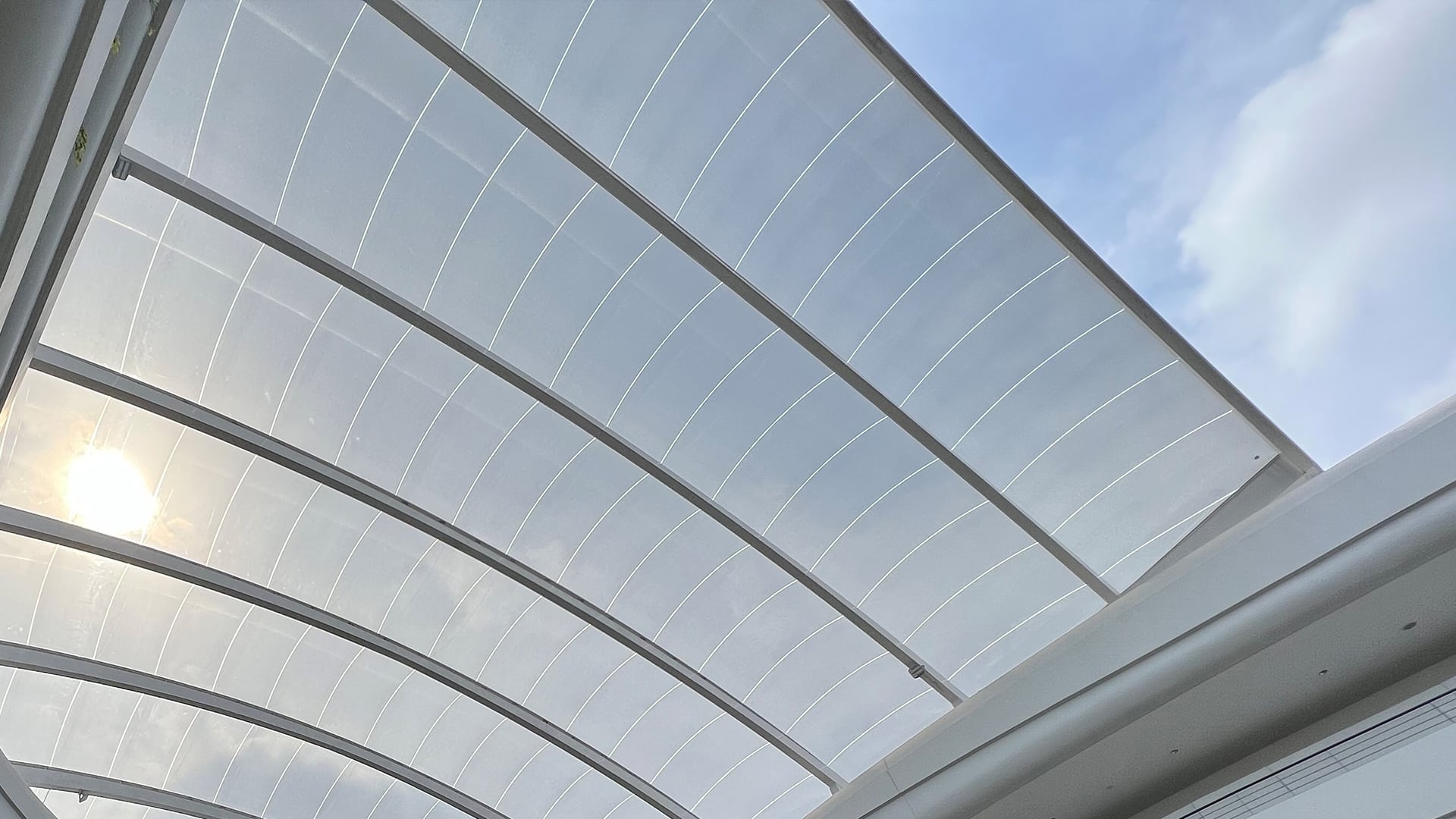 A Texlon ETFE canopy covers the entrance of K Mall Cambodia. It has a span of 30 meters with a slight twist.